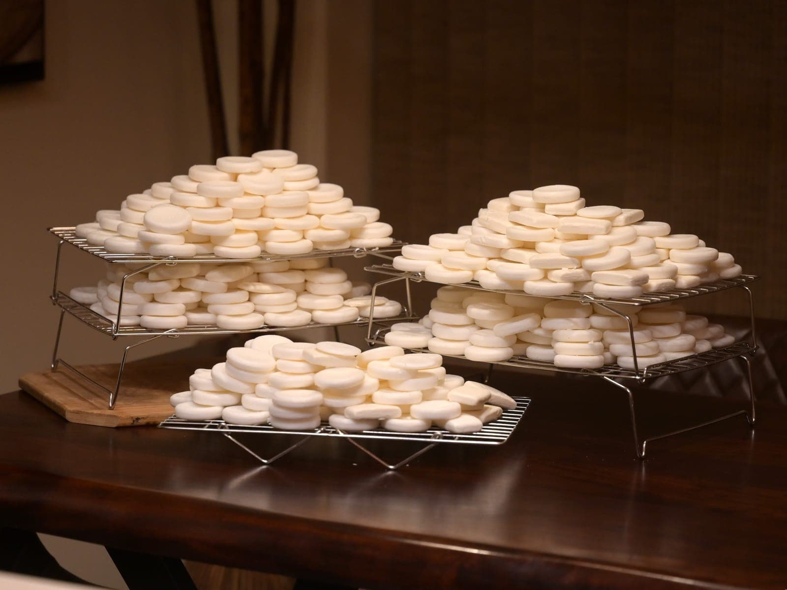 Photo: gloved hands sorting collected soap bars into a labelled bin.